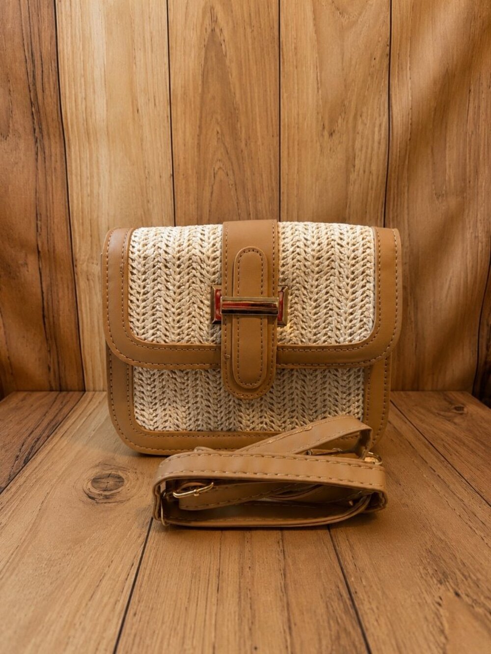 Tan and cream woven flap handbag featuring a textured chevron design